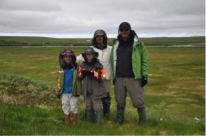 Taking vegetation relevees on the pingo south of the Berelech river, with Olga Khitun and the Schaepman family, who is testing ecotourism at Kytalyk station. The kids are impressed by the tundra life and seem to bother much less than adults about the mosquitos. Photo: O. Khitun, 21 July 2013.