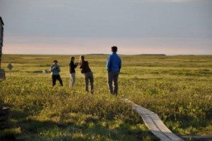 Photo shooting session at midnight. Who takes the nicest picture of the pingo 5km away? (Photo: G. Schaepman-Strub, 7 July 2013).